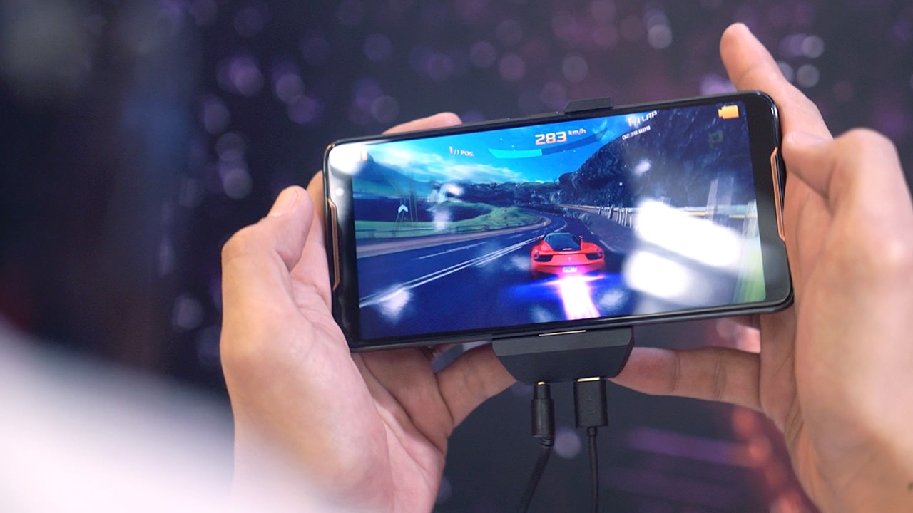 Mobile gaming demonstration shown on a smartphone screen during a technology showcase